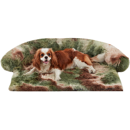 A small dog lounging on Inspaws green camo fluffy faux fur couch cover sofa bed on white background