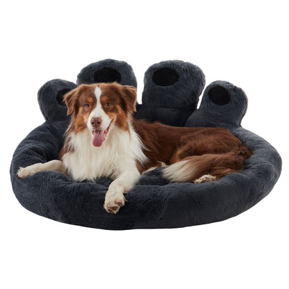 Border Collie resting in Inspaws dark grey velvet calming paw dog bed flat view on white background