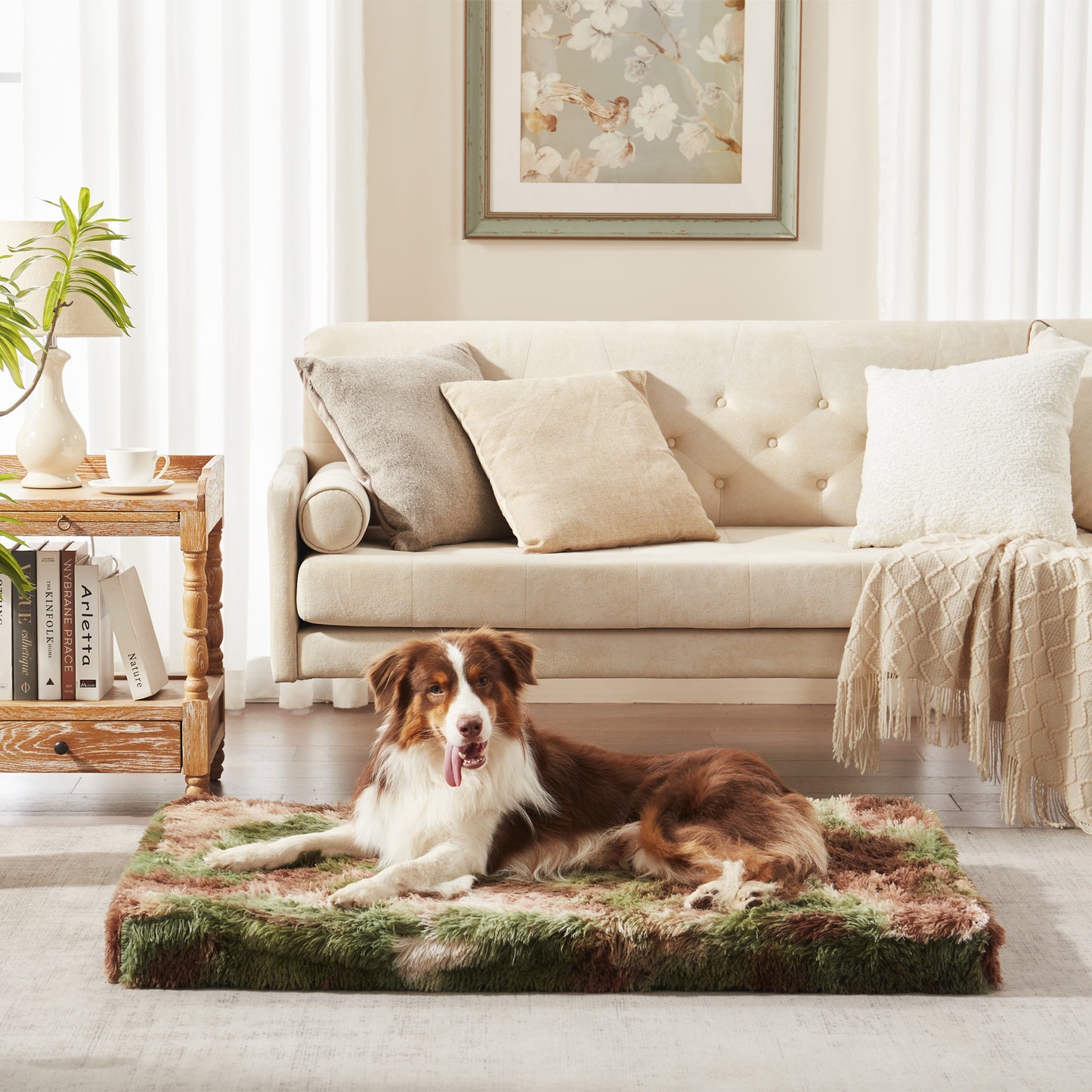 Dog lounging on green camo Inspaws orthopedic pillow bed on floor
