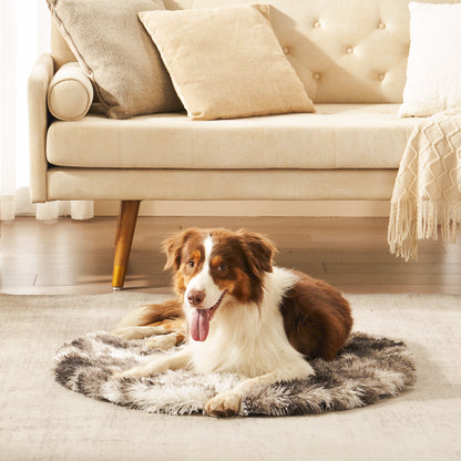Border Collie lounging on Inspaws portable calming round pet mat in ink tie-dye in living room