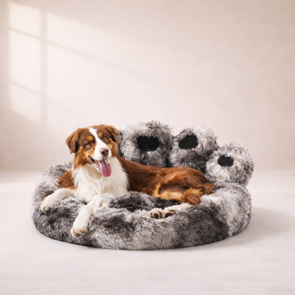 Dog resting in Inspaws calming plush paw dog bed in ink tie-dye faux fur