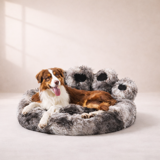 Dog resting in Inspaws calming plush paw dog bed in ink tie-dye faux fur